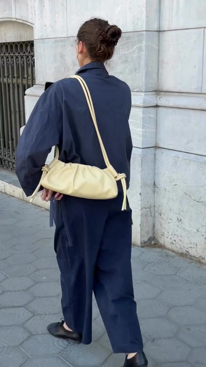 Blending functionality and elegance, the Dumpling Bag is des